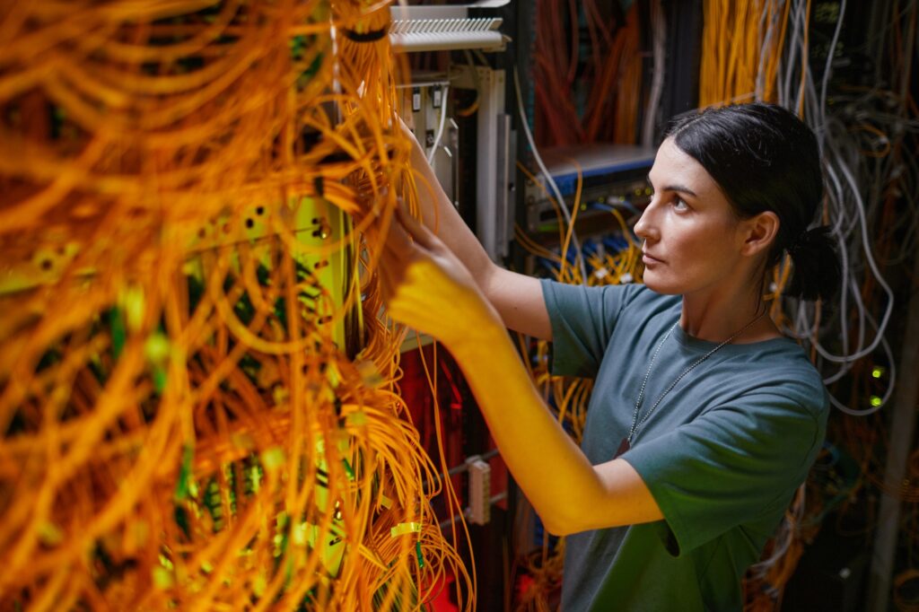 Woman Managing Server Network Side View